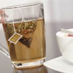 glass filled with green tea