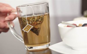 glass filled with green tea